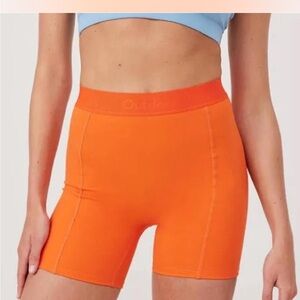 Outdoor Voices SuperForm 5“ Shorts Zipper Pocket Sundance Orange Womens S NWT